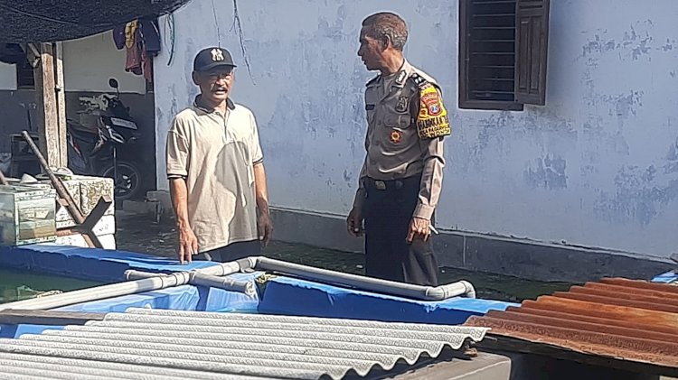 Bhabinkamtibmas Desa Pagerngumbuk Wonoayu Cek Budidaya Ikan Nila untuk Ketahanan Pangan